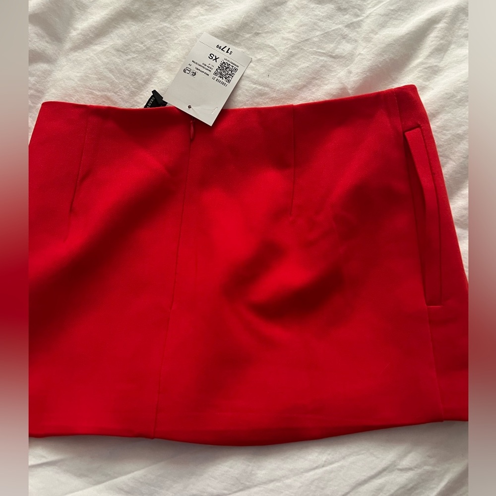 Brand new red mini skirt